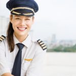 Professional,commercial,pilot,woman,at,the,airport.,aviation.
