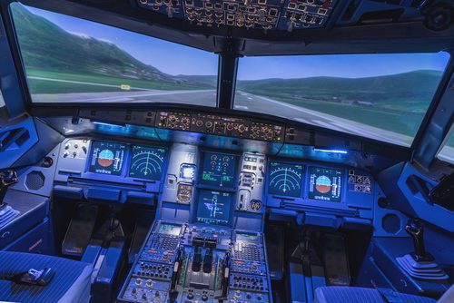 A,view,of,the,cockpit,of,a,large,commercial,airplane,